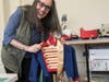 Visit the studio of a costume and puppet artist.