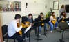 RBR Guitar Majors practicing in their RBR classroom.  