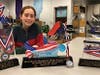 Charlotte Jansky displays band awards