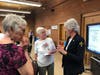 Deaconess Lori Trinche of Redeeming Life Outreach Ministries talks to supporters of the new northern Illinois maternity home [https://www.rlom.org/expansion].