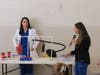 MCC students Shelbie Qasawa and Kariann Mengele demonstrate how the healthy and unhealthy lungs respond to inflation