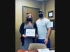 Athens Principal Dr. Lara Dixon receives ESGR "Patriot Award" earlier this school year from teacher and US Coast Guard Maritime Law Enforcement Specialist, Petty Officer 2nd class Nick Lusk