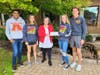 Troy Athens High School cross country captains present a donation to Troy People Concerned.  L to R:. From left to right: senior Ibrahim Ali, senior Hannah DiGiovanni, (Florence Parent), senior Erin Swartz, and junior Andrew Linden.