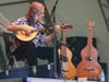 David Lindley concentrates on his bouzouki playing.