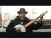 Jerron "Blind Boy" Paxton strummin' some acoustic blues.