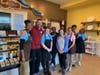 Janette and Dennis Looney with team at Nothing Bundt Cakes in S. Euclid