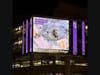 GBH Digital Mural at night featuring "When Celestial Worlds Collide"