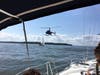 Helicopter capturing photos & video of fleet underway in LI Sound.