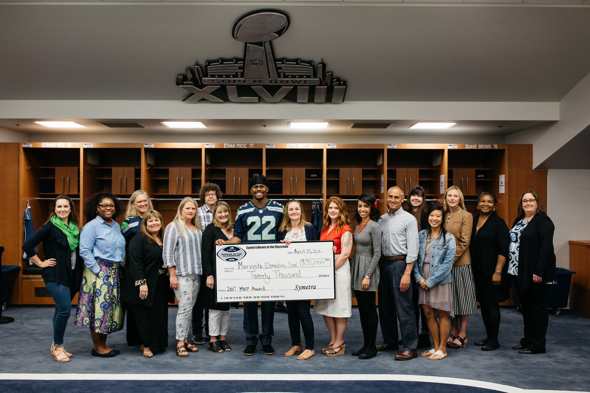https://patch.com/img/cdn20/users/1114814/20180501/060914/styles/raw/public/processed_images/all_16_2017_symetra_heroes_in_the_classroom_honorees_with_seahawk_cj_prosise-1525212379-3327.jpg