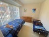 A furnished children’s bedroom is waiting for its new tenants.