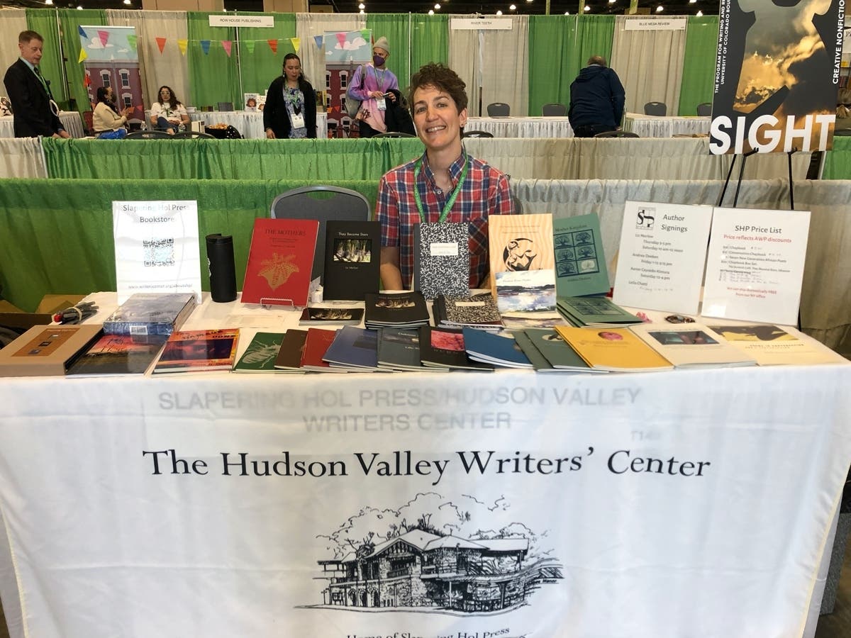 Andrea Deeken at the Slapering Hol Press table during March's Association of Writers & Writing Programs event.