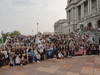 Volunteer lobbyists from across the United States gather on the steps of the Library of Congress on July 28.