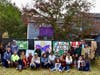 Group gathers on the rail trail behind a direct abutters property in front of newly commissioned public art. 
