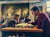 Horse Thieves Tavern features chess/checker board branded onto the tabletop, as well as other family-favorite board games