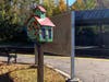 The newly-repainted, little free library is now reinstalled at the Endicott MBTA Commuter Rail Station, complete with a coat of marine spar varnish and solid brass hinges and latch.