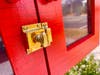 The newly repainted library has been finished with a coat of marine spar varnish, and outfitted with solid brass hinges and latch hardware.
