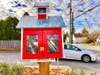 The Little Free Library is already stocked with books, which patrons access for free.
