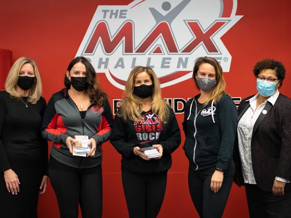 Union County Freeholder Rebecca L. Williams joined Deputy County Manager Amy Wagner to thank Max Challenge gym owners Allison DiMarzio and Amy Walsh, and gym manager Sara Kirsch.