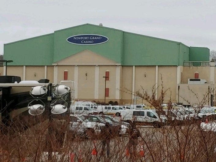 National Grid trucks and crews at the headquarters set up in the former Newport Grand casino parking lot.