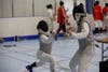 Fencers are pictured competing in Women’s Foil.