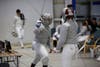 Fencers are pictured competing in Women’s Saber.
