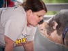 Cindy Blake, Parkwood branch manager, TruMark Financial, was the top individual fundraiser and kissed Raines, the pot-bellied pig, at the Ninth Annual TruMark Financial Kiss-a-Pig Financial Literacy Fundraiser held at the Abington Art Center on Oct. 2.