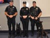 Sergeant Bloomingdale (center), created and manages the Police Department K9 Unit’s Facebook page and serves as “Work Mom” to K9s Jolie (left, pictured with her handler Officer Blanchard) and Murph (right, pictured with his handler Officer Plum). 