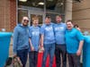 Reggie Rytter (Right) celebrates the grand opening of his third UPS Store in The Shops at Valley Square with students from ATG Learning Academy. 