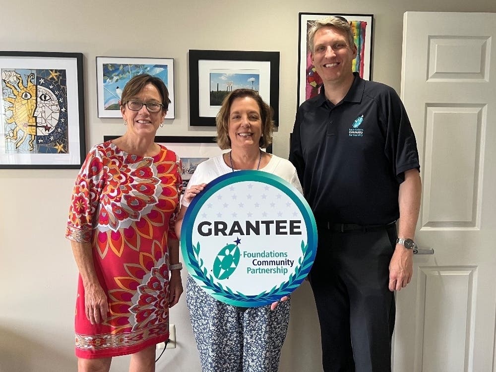 Dr. Tobi Bruhn, Executive Director, Foundations Community Partnership, visited NOVA’s Jamison office to present a check to Penelope Ettinger, Executive Director, NOVA (left); and Michelle Cash, Director of Development, NOVA (right). 