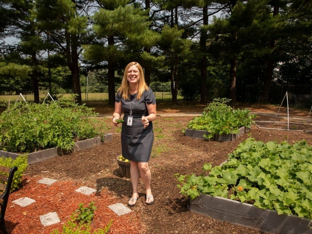 Hop Brook Principal Kathryn Taylor in the school garden