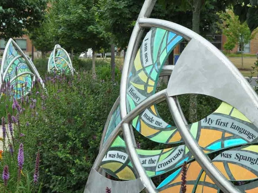  Three of the sculptures are located along the walkway between the College’s Technology Hall and Founders Hall forming a series of what artist Beverly Precious calls “wind words."