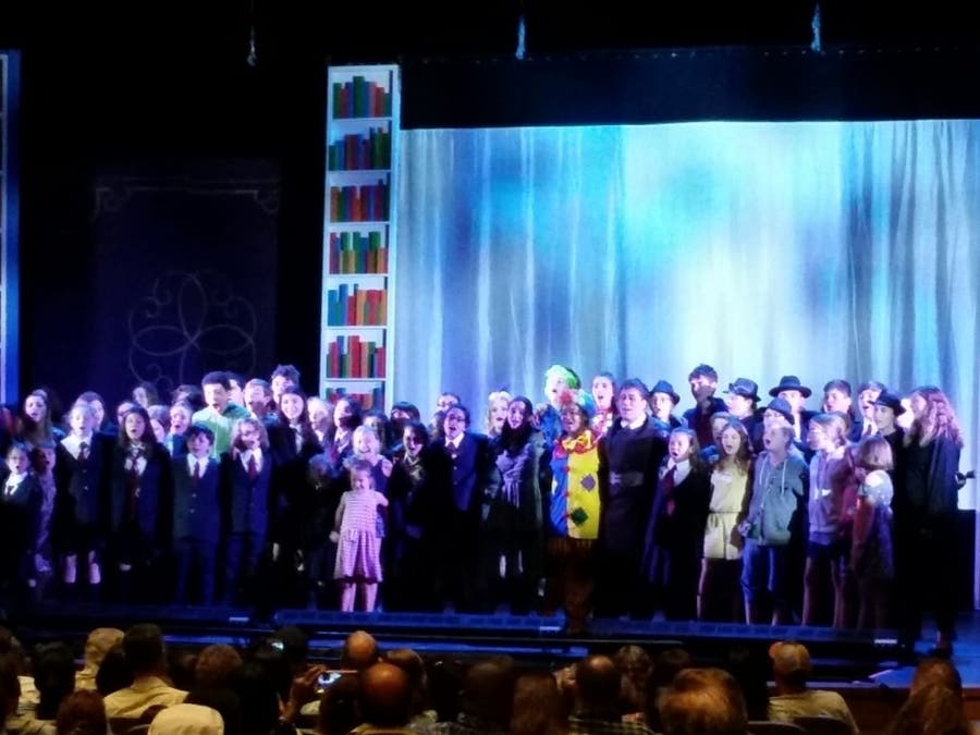 Members of both casts of MATILDA sing their theme song after curtain call