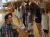 Michael Unger directs some of the young performers in rehearsal