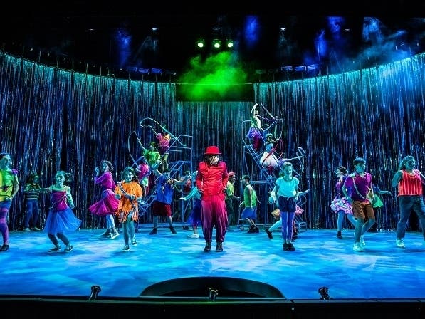 Lawrence Cummings as Sebastian (center) with ensemble members