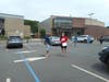 Music teacher Cathy Tullo (in Red for Ed shirt) takes attendance of the participating teachers