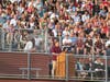 Jeffrey Litke, Chair of the Board of Education, addresses the graduates before presenting scholarships to the top ten scholars