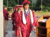 The top ten members of the Class of 2022 leaving the stage