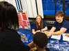  Quinnipiac nursing students Abigail Crowell, left, & Maverick Hammond presented information on staying healthy and safe, first aid, calling 911 and the importance of sleep hygiene during Wellness Night activities at Hamden’s West Woods Elementary School