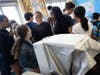 Spring Glen sixth-graders wait their turn to use a UV camera-equipped skin analyzer. A group of Quinnipiac University first-year medical students brought a timely message about sun safety to the elementary school on Tuesday.