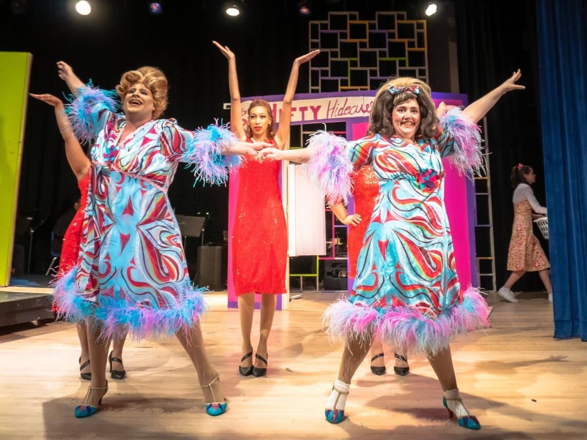 Summer Orlando (at left) as Edna and Mollie Leonard as Tracy with The Dynamites