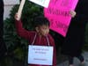 The Shirley community protests in front of a CWC location