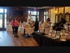 A shot taken inside the club where a silent auction and raffles raised additional funds for the event.