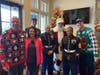 Participants in the 16th Annual Toys for Tots/TurningPoint golf outing gather inside the clubhouse at Echelon Golf Club.  