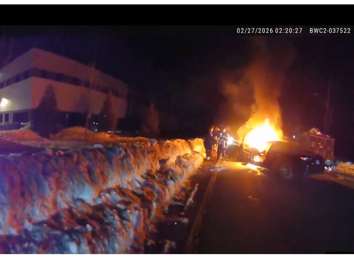 An Easton police officer and two good Samaritans saved a man trapped in a burning car, body cam video shows.