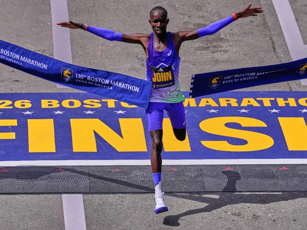 Defending Boston Marathon champion John Korir defended his title Monday, setting a course record with his win.
