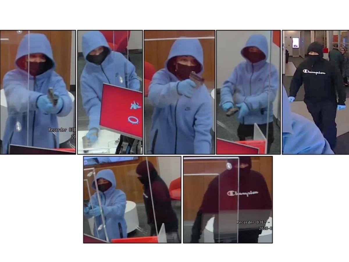 Two men robbed Santander Bank in Roxbury at gunpoint Tuesday morning.