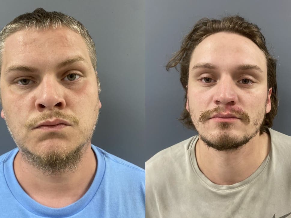 Two bothers were arrested on conspiracy and drug charges following a suspected overdose death, police said.