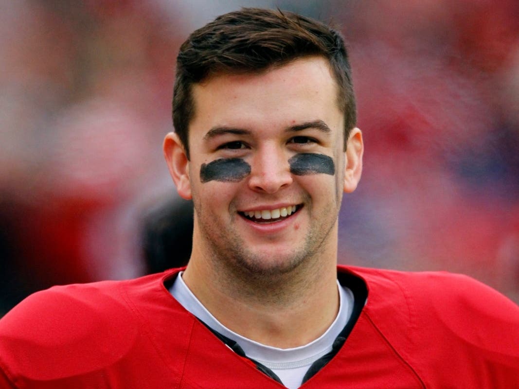 Former NFL quarterback AJ McCarron will coach the Rhode Island United Football League team in its inaugural season.
