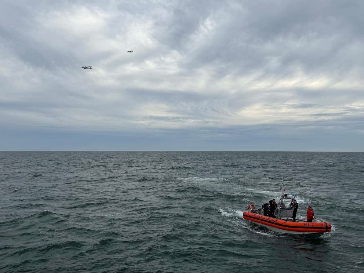 In this photo released by U.S. Coast Guard, crew members search by air and on the water for a Boston-bound air ambulance that vanished off the coast of Nantucket, Massachusetts, on Saturday, Oct. 3, 2026.