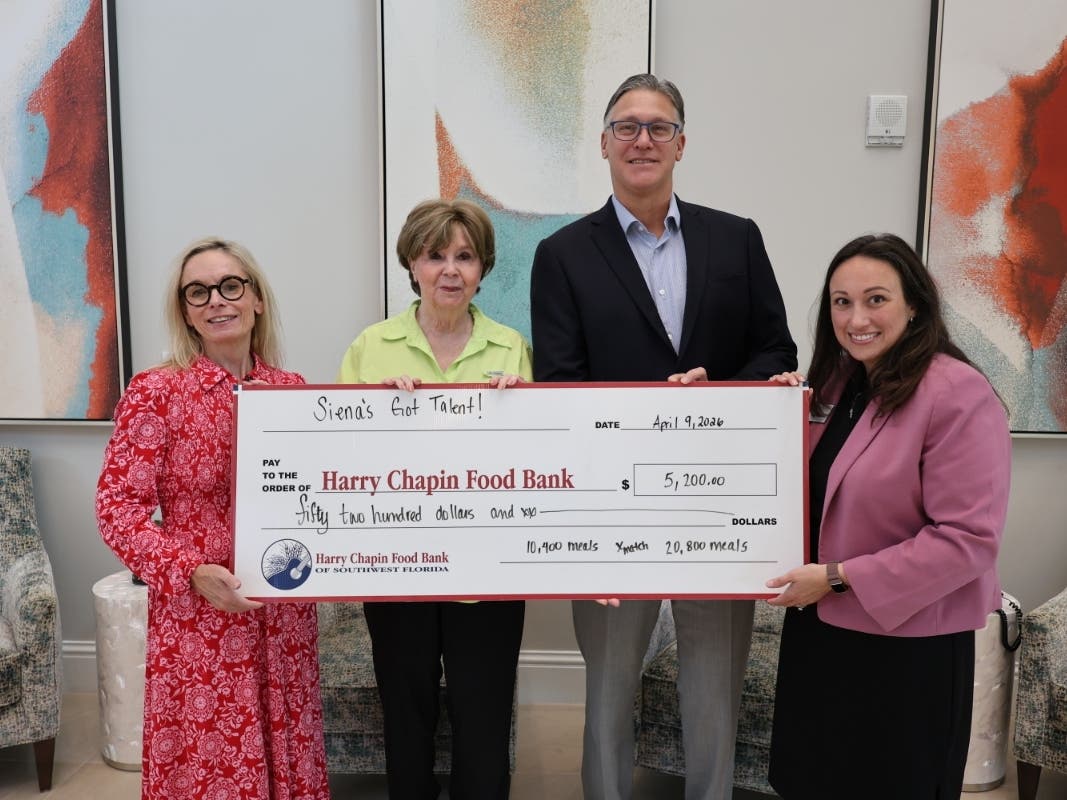 From left to right: Grant Manager at Harry Chapin Food Bank Elizabeth Lewis, Siena Lakes resident Diane Ketcham, Siena Lakes Executive Director Michael McCormick and Chief Development Officer at Harry Chapin Food Bank Jennifer Denike.